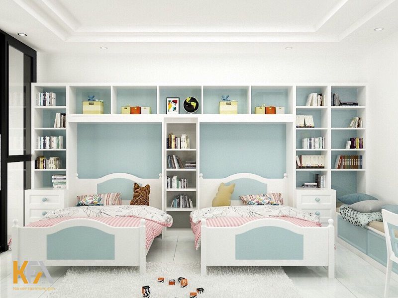 Phòng ngủ màu xanh pastel dành cho 2 chị em kết hợp với hệ tủ sách tiện nghi