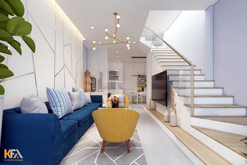 Nội thất phòng khách nhà ống đẹp hiện đại có cầu thang với ghế sofa màu xanh dương nổi bật