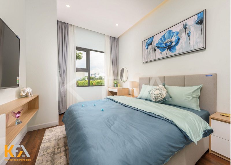 Giường ngủ sử dụng gam màu xanh chủ đạo giúp phòng thêm phần trẻ trung và tinh tế
