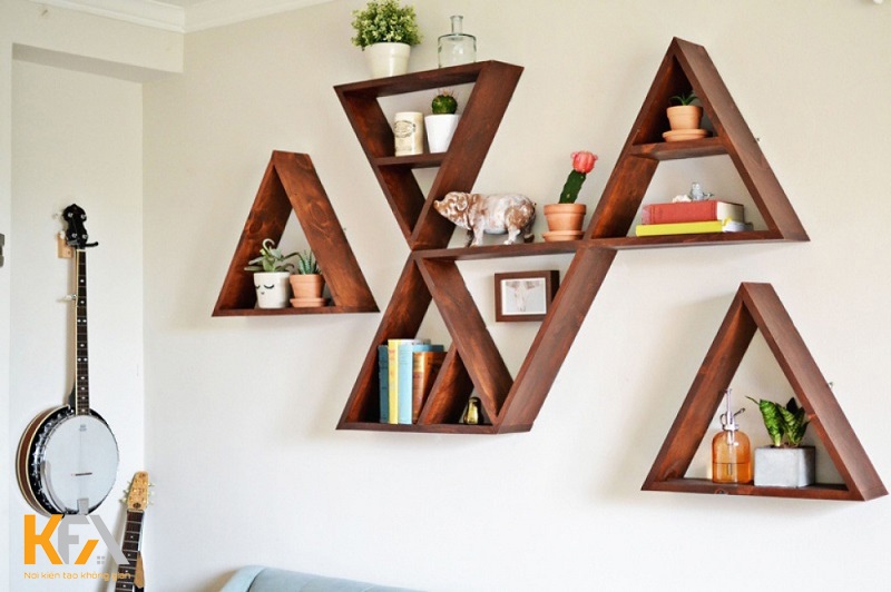 Trang trí phòng khách bằng ô treo tường hình tam giác