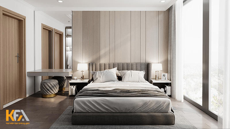 Không gian phòng ngủ vô cùng đơn giản với chiếc giường lớn êm ái, cùng 2 tab đầu giường và bàn trang điểm 
