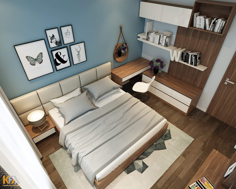 Thiết kế phòng ngủ nhỏ thông minh với tủ tường và bàn học kết hợp.