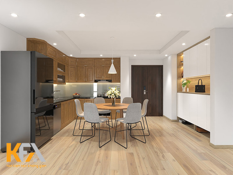 Phòng bếp đầy ấn tượng với tủ bếp gỗ tự nhiên và bàn ăn tròn