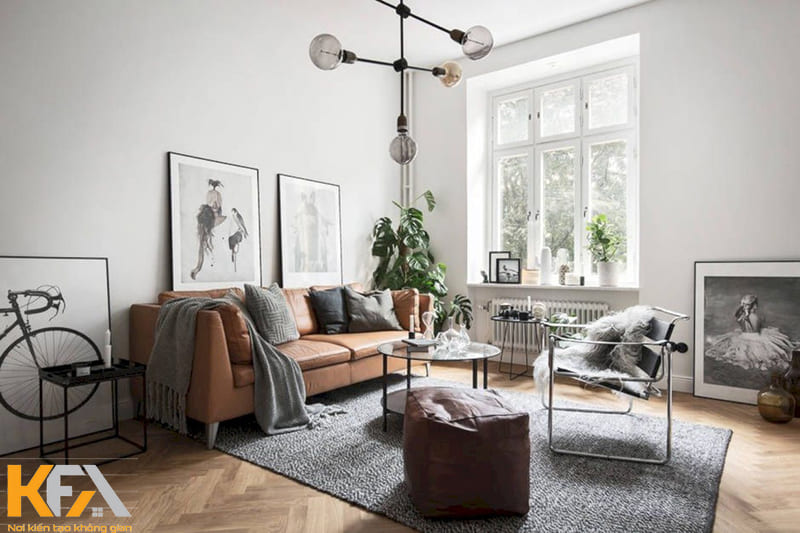 Lựa chọn một chiếc sofa màu nâu ấm là ý tưởng của thiết kế phòng khách này