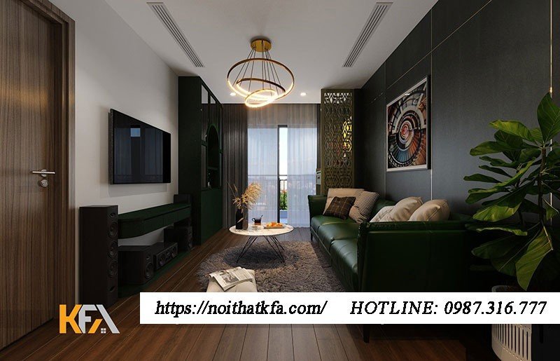 Phòng khách của căn hộ không quá lớn với nội thất tối màu, nổi bật nhất là màu xanh rêu sang trọng