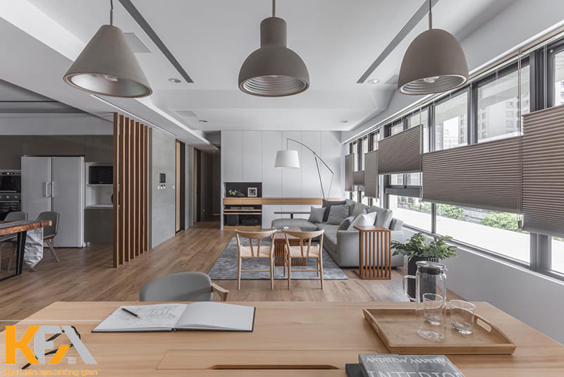 Bạn cần tối giản hóa nội thất để có được sự liên kết giữa không gian phòng bếp và phòng khách