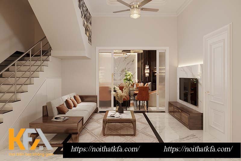 Phòng sinh hoạt chung bao gồm khu vực thư giãn với bộ sofa, bàn trà, kệ tivi được làm từ chất liệu gỗ tự nhiên