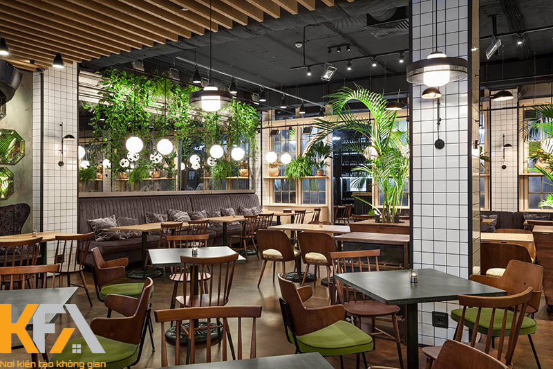 Trang trí quán cafe không gian mở bằng cây xanh là cách làm phổ biến hiện nay