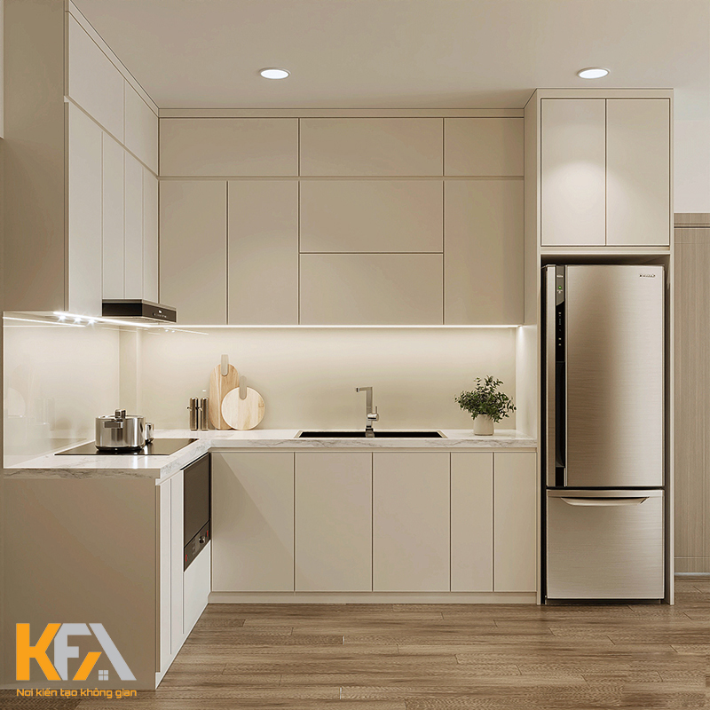 Phòng bếp được thiết kế đơn giản với tủ bếp nhựa chữ L