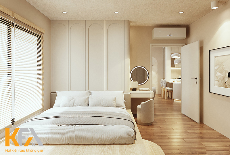 Phòng ngủ master sử dụng giường ngủ bệt với nội thất gỗ sáng màu
