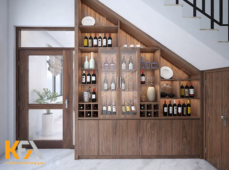 Mẫu tủ rượu gỗ công nghiệp âm tường dưới gầm cầu thang được thiết kế khéo léo